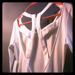 White long sleeve strappy back body con dress